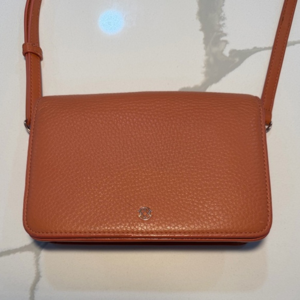 Dagne Dover peach leather crossbody bag